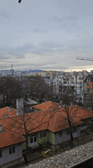 Sofia cityscape captured from elevated position on cloudy day