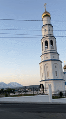 Assumption Cathedral stands against Kamchatka's snow-capped volcanoes