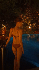 Nighttime swimming captured at illuminated pool in Kediri, Indonesia