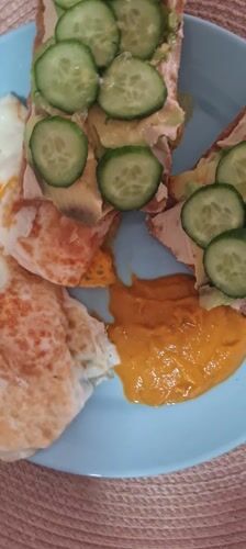 Weekend breakfast documented in Nahariyya features avocado sandwiches and eggs