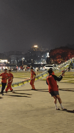 Night scene captured at Da Lat lake with reflective lights