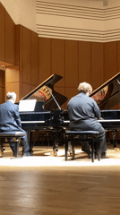 Piano duet performed at Moscow concert hall