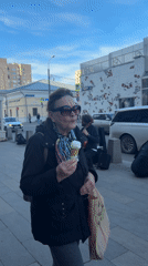 Moscow street life: busker, robots, coffee captured downtown