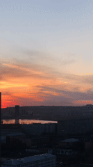 Dramatic sunset captured in time-lapse over Krasnoyarsk cityscape