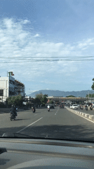 Early morning traffic captured on divided road in Banda Aceh