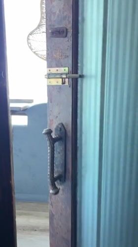 Rustic wooden door captured in Arica, Chile