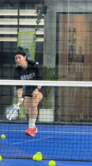 Indoor padel session at a Thai academy, multiple players in action