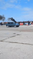 Two cars drag race on track in Ostrovo, Bulgaria