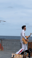 Elvis impersonator performs on Barcelona waterfront promenade