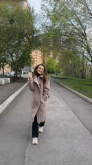 Woman documents casual afternoon stroll in Kryvyi Rih, Ukraine
