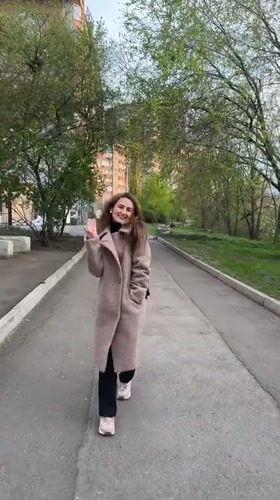 Woman documents casual afternoon stroll in Kryvyi Rih, Ukraine