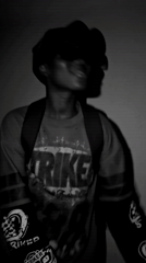 Person in "STRIKE" shirt filmed in Nkwelle, Nigeria