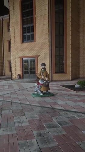 Nighttime scenes documented across Sergeevka, Russia showing statues and vehicles
