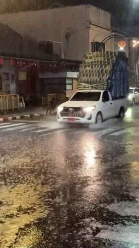 Phuket old town rides out a heavy evening rainstorm