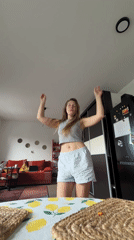 Woman films morning dance session in Belgrade apartment