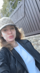 Woman in designer attire spotted in Mishutkino, Russia