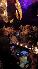 DJ performs at Sofia nightclub with crowd gathering