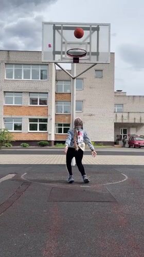 Casual basketball game observed at outdoor court in Brest