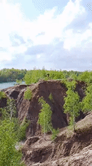 Witness films scenic turquoise lake near Pisarevo, Russia