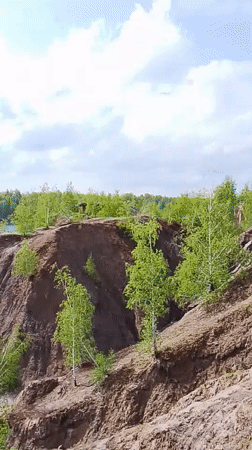 Witness films scenic turquoise lake near Pisarevo, Russia