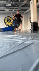 Men practice martial arts and wrestling in Perm gymnasium