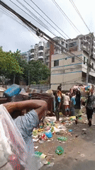 Morning street life documented in South Asian urban district
