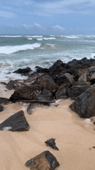 Tourist documents scenic Ahangama beach views in Sri Lanka
