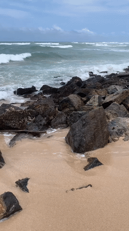 Tourist documents scenic Ahangama beach views in Sri Lanka