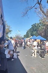 Kupang street market buzzing on a sunny morning