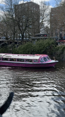 Spring afternoon scenes documented across Amsterdam's canal district