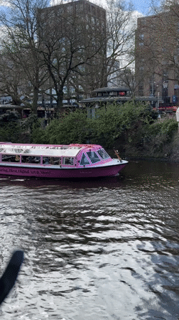 Spring afternoon scenes documented across Amsterdam's canal district