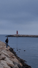 Evening harbor life documented across Dénia, Spain waterfront district
