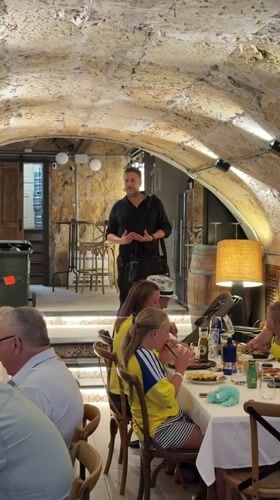 Informal gathering at a rustic Palmanova restaurant, evening
