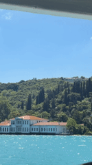 Boat passenger documents Bosphorus journey past Ottoman landmarks
