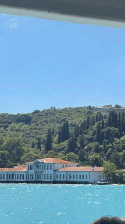 Boat passenger documents Bosphorus journey past Ottoman landmarks