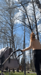 Woman with stroller observed at park in Votkinsk, Russia