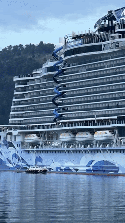 Cruise passengers and locals exchange waves at Montenegro port