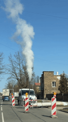 White van equipment emits vapor on Riga street