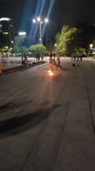 Fire performers entertain crowds at Sofia's National Palace plaza