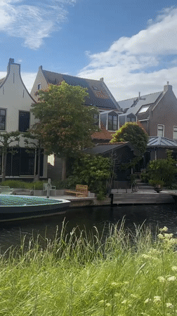 Canal stroll documented with decorative sneakers in Katwijk