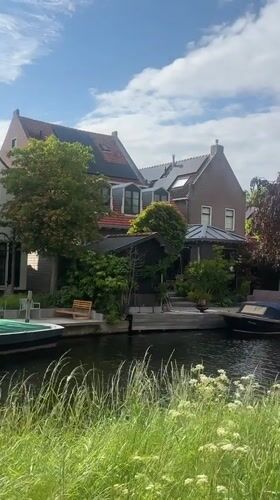 Canal stroll documented with decorative sneakers in Katwijk
