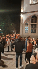 Candlelight gathering draws crowd to Gabrovo building entrance