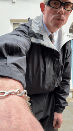 Man poses outside white building in central London