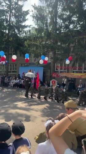Children in military uniforms commemorate Victory Day in Russia