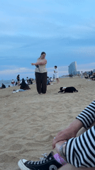 Barcelona beach picnic with deli sandwiches documented by visitors
