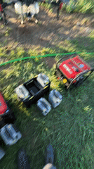 Worker prepares agricultural drone equipment in Bulgarian field