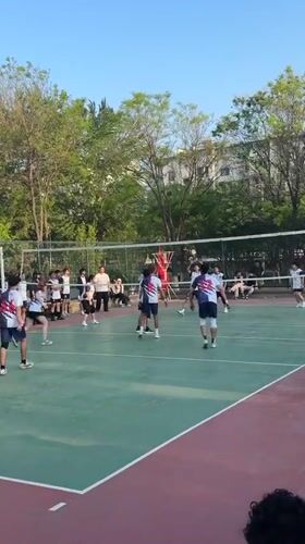 Morning volleyball game and street activity in Zhongtun, China