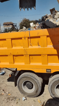 Heavy machinery clears construction and mixed waste in Shymkent