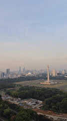 Aerial views capture Jakarta's National Monument amid hazy cityscape