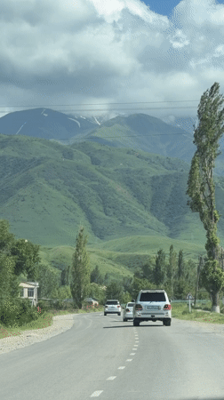 Scenic mountain drive documented in rural Kyrgyzstan